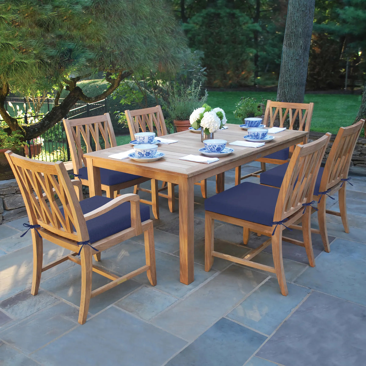 Outdoor dining set with wooden table and chairs of Favoyard outdoor seat cushion