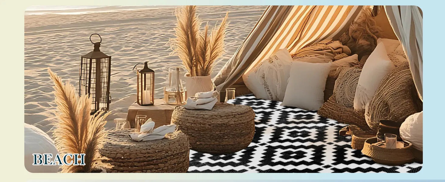 Outdoor seating area with cushions and a Favoyard rug by the beach.