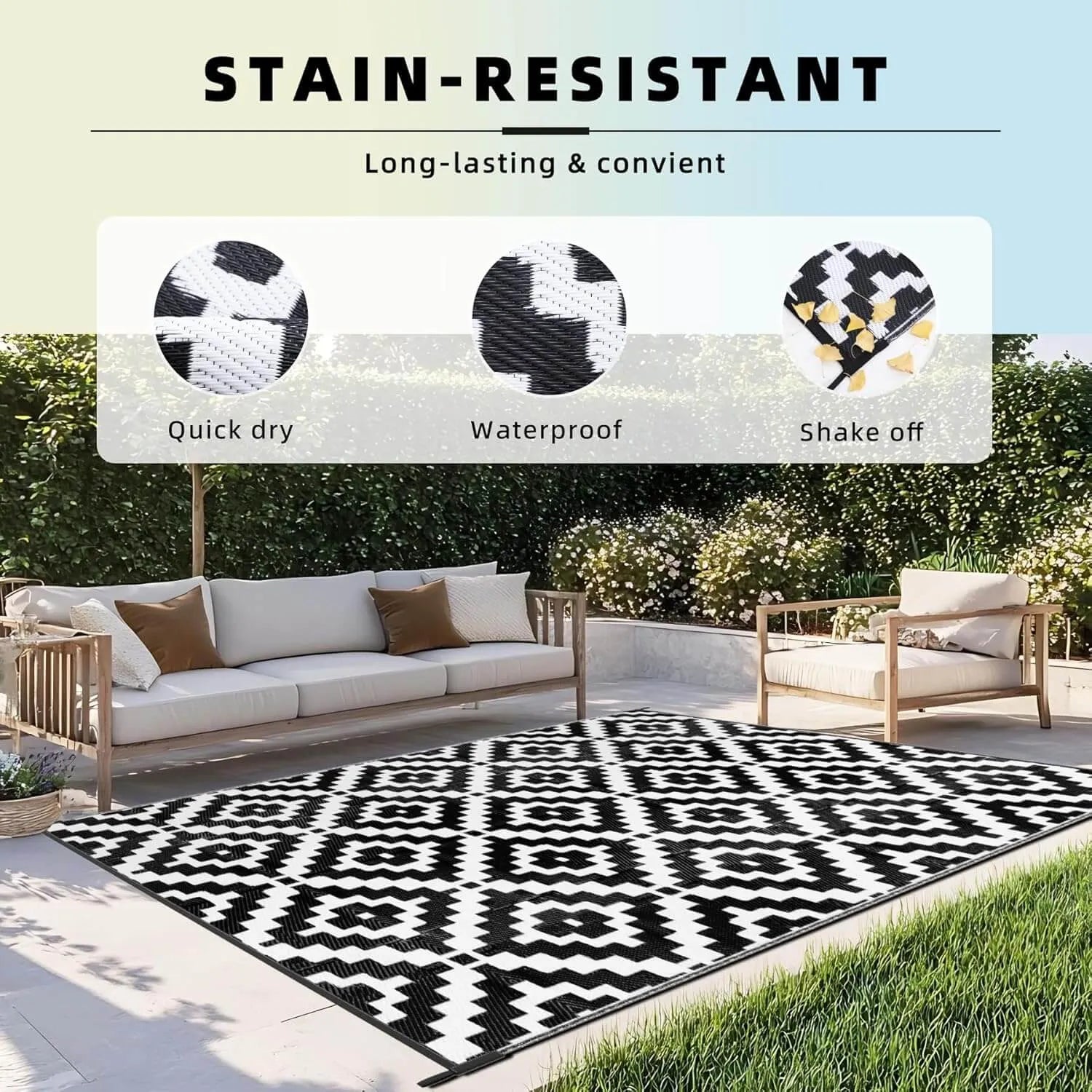 Outdoor patio with a black and white patterned Favoyard outdoor rug