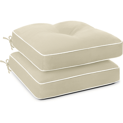 Two beige cushion sets with white piping 