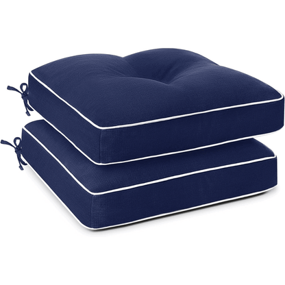 Two navy blue cushion sets with white piping