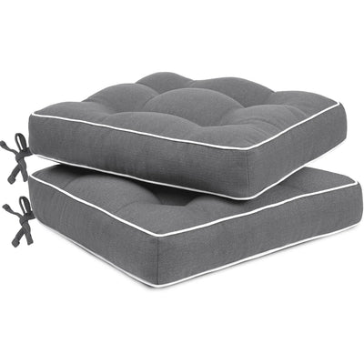 Two gray cushioned with white piping 