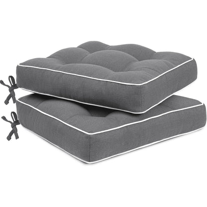 Two gray cushioned with white piping 